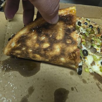 MrJims.Pizza - Burnt crust of a sticky fingers - Pizza Near Me - Little Elm, Texas