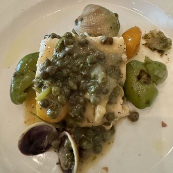 Roberto's - Halibut with olives, capers and clams - Italian Near Me - Bronx, New York Roberto's - Halibut with olives, capers and clams - Italian Near Me - Bronx, New York