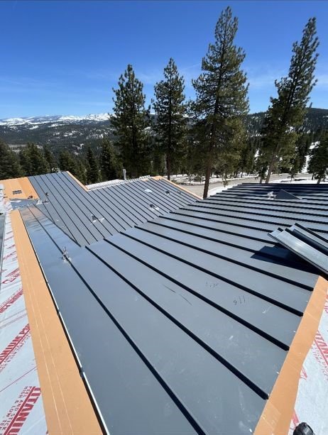 Slide of Manny's Metal Roofing