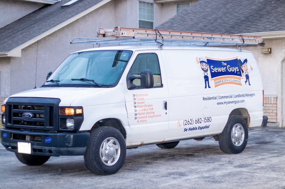 Slide of The Sewer Guys