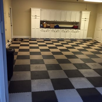 Floors & Finishes - a garage with a checkered floor - Flooring Near Me - Tyler, Texas Floors & Finishes - a garage with a checkered floor - Flooring Near Me - Tyler, Texas