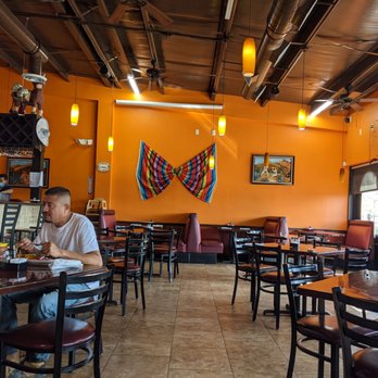 Tequilas Mexican Grill - a man and a woman sitting at a table - Mexican Near Me - Katy, Texas Tequilas Mexican Grill - a man and a woman sitting at a table - Mexican Near Me - Katy, Texas