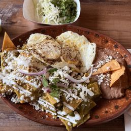 Chilaquiles Divorciado, Half green half poblano Chilaquiles Divorciado, Half green half poblano