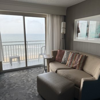Courtyard by Marriott Carolina Beach Oceanfront - Nice little couch, movable ottoman and side table. - Hotels Near Me - Carolina Beach, North Carolina Courtyard by Marriott Carolina Beach Oceanfront - Nice little couch, movable ottoman and side table. - Hotels Near Me - Carolina Beach, North Carolina