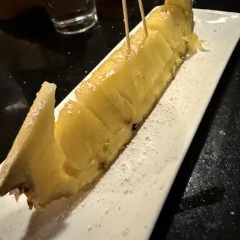 John Holly's Asian Bistro - Pineapple Served at the end of meal - Asian Fusion Near Me - Lone Tree, Colorado John Holly's Asian Bistro - Pineapple Served at the end of meal - Asian Fusion Near Me - Lone Tree, Colorado