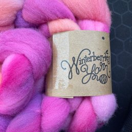 Hand-dyed spinning fiber, dyed by the shop owner. She has one-of-a-kind handspun yarns for sale, as well! Hand-dyed spinning fiber, dyed by the shop owner. She has one-of-a-kind handspun yarns for sale, as well!