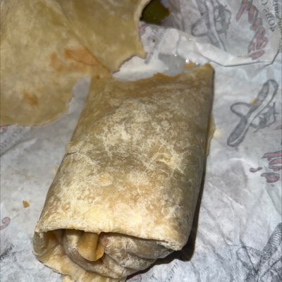 Photo of Roberto's Taco Shop - Las Vegas, NV, US. a burrito wrapped in paper