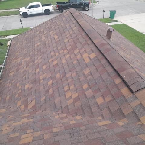 Slide of Urbina Roofing