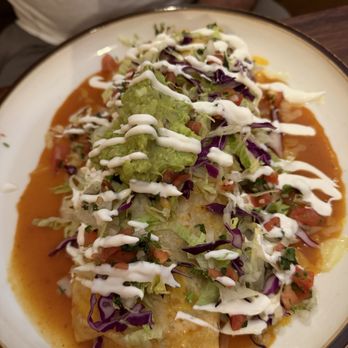El Dorado - His shredded beef wet burrito. It's huge - New Mexican Cuisine Near Me - Dublin, California