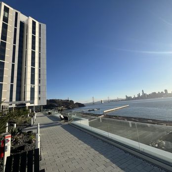 Isle House Apartments - Shared roof deck and tower with Bay Bridge and Mainland SF skyline in background. - Apartments Near Me - San Francisco, California