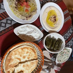 Arabian Nights Bistro - Dolmas, baba ghanouj, delicious yogurt sauce and hummus
