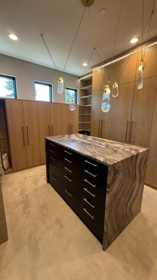 Master suite closet - on this project, we removed an old laminate closet system and replaced with all real wood stained to specifications Master suite closet - on this project, we removed an old laminate closet system and replaced with all real wood stained to specifications