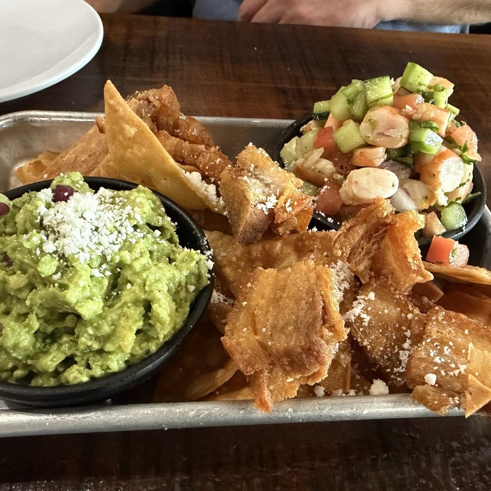 Appetizer of guacamole and ceviche Appetizer of guacamole and ceviche