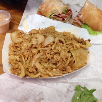 7th St. Café - Large onion leashes and the godfather in the background. - Sandwiches Near Me - Frederick, Maryland