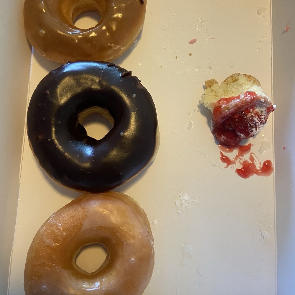 That's the only piece of the cherry top donut that made it to the photo op. That's the only piece of the cherry top donut that made it to the photo op.