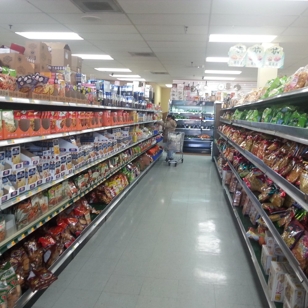 India Market - a wide aisle of food items - International Grocery Near Me - Knoxville, Tennessee