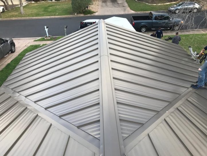 Slide of Green Knight Metal Roofing