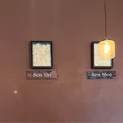 Noodle types framed on wall.