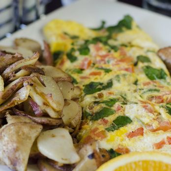 Keke's Breakfast Cafe - Breakfast Omelet with side of potatoes - Breakfast & Brunch Near Me - Gainesville, Florida