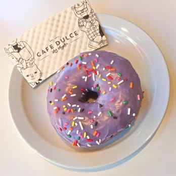 Cafe Dulce - Original cake donut w/a blueberry glaze. YUM! Specially created to celebrate JDilla's 10 year anniversary of Donuts. - Coffee & Tea Near Me - Los Angeles, California Cafe Dulce - Original cake donut w/a blueberry glaze. YUM! Specially created to celebrate JDilla's 10 year anniversary of Donuts. - Coffee & Tea Near Me - Los Angeles, California