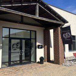 Pyour Core/Synergy Hot Yoga - The front of our studio, suite 7 located in the back of the parking lot