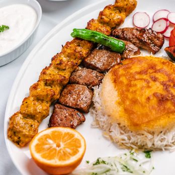 Zaffron Restaurant - Two skewers of charbroiled juicy ground beef and ground chicken seasoned with saffron and spices. - Persian/Iranian Near Me - North York, Ontario Zaffron Restaurant - Two skewers of charbroiled juicy ground beef and ground chicken seasoned with saffron and spices. - Persian/Iranian Near Me - North York, Ontario