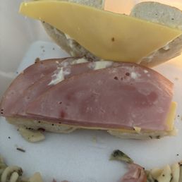 This is my $12 ham and cheese sandwich with lettuce and tomato. Well there was no lettuce and tomato but I did order it pitiful. This is my $12 ham and cheese sandwich with lettuce and tomato. Well there was no lettuce and tomato but I did order it pitiful.