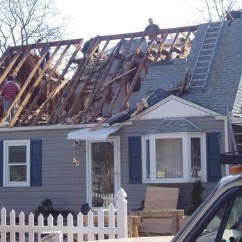Accurate Contractors - the roof of a house that has been damaged - Roofing Near Me - Totowa, New Jersey Accurate Contractors - the roof of a house that has been damaged - Roofing Near Me - Totowa, New Jersey