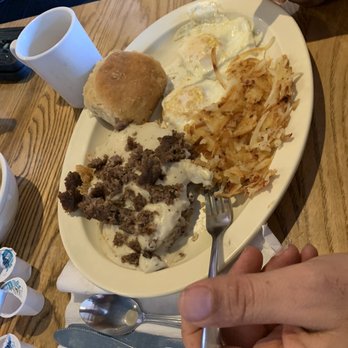 Ost Restaurant - Chicken fried steak with sausage gravy, hash browns, over easy eggs and a biscuit - American Near Me - Bandera, Texas Ost Restaurant - Chicken fried steak with sausage gravy, hash browns, over easy eggs and a biscuit - American Near Me - Bandera, Texas