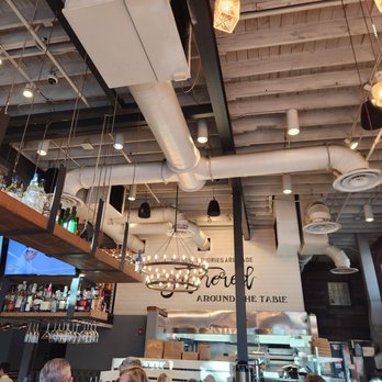 Boca - inside near bar looking up to second floor dining. - New American Near Me - Sarasota, Florida