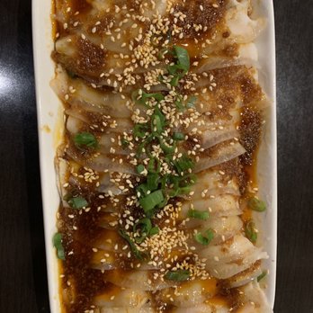 Chengdu Taste - Sliced pork belly and garlic sauce with cucumbers underneath - Szechuan Near Me - Alhambra, California Chengdu Taste - Sliced pork belly and garlic sauce with cucumbers underneath - Szechuan Near Me - Alhambra, California
