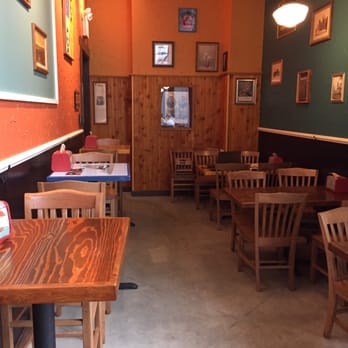 Potbelly - There is a line of seats around the corner from the "main" seating and ordering area. - Sandwiches Near Me - Richmond, Virginia