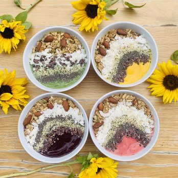 Kaffe Landskap - four bowls of various toppings - Coffee & Tea Near Me - New York, New York