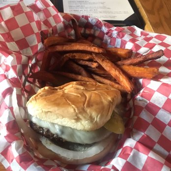 LTD Bar & Grill - Burger with sweet potato fries. It didn't come with lettuce or tomatoes... - Sports Bars Near Me - Seattle, Washington