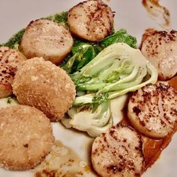Seared Scallops with Red chile parsnip cream and mashed potato croquettes.