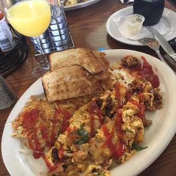 Boulevard Cafe - Chorizo scramble with mimosa - New American Near Me - Daly City, California Boulevard Cafe - Chorizo scramble with mimosa - New American Near Me - Daly City, California