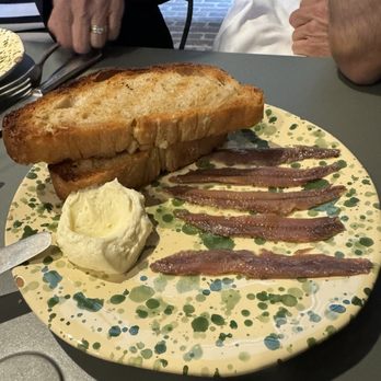 Lioness - Anchovies, Olive Oil, Cultured Butter, Ciabatta - Italian Near Me - Seattle, Washington Lioness - Anchovies, Olive Oil, Cultured Butter, Ciabatta - Italian Near Me - Seattle, Washington