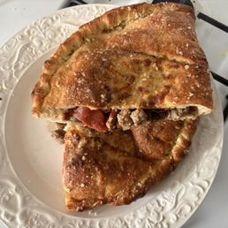 This is the calzone I got from Jano's today. Thank you, Christina and Cena for remaking my calzone and giving me a full refund. This is the calzone I got from Jano's today. Thank you, Christina and Cena for remaking my calzone and giving me a full refund.