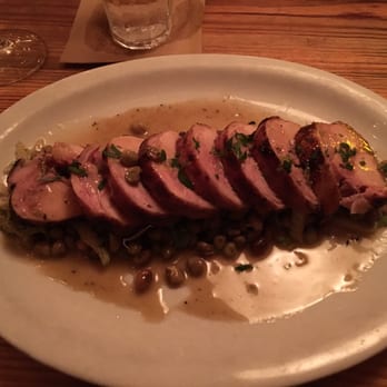 Wild Olive - Dinner special, rabbit saddle. Stuffed with house made sweet sausage and served Overtop of peas and Napa cabbage au jus - Italian Near Me - Johns Island, South Carolina Wild Olive - Dinner special, rabbit saddle. Stuffed with house made sweet sausage and served Overtop of peas and Napa cabbage au jus - Italian Near Me - Johns Island, South Carolina