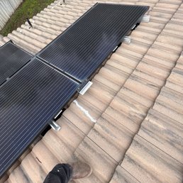 Roofing where the problematic leak is occurring (under the solar panels). Roofing where the problematic leak is occurring (under the solar panels).