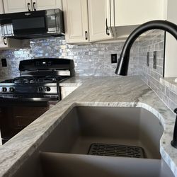 Hampton's Kitchens & Appliances - My new granite countertop, quartz composite sink and faucet. Backsplash and microwave all from Hamptons.