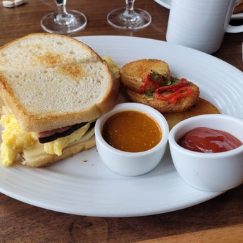 the C restaurant + bar - Egg sandwich, with spicy salsa and potatoes - Seafood Near Me - Monterey, California the C restaurant + bar - Egg sandwich, with spicy salsa and potatoes - Seafood Near Me - Monterey, California