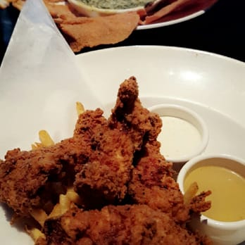 Yard House - Fried Chicken strips and spinach cheese dip on Happy Hour menu - New American Near Me - Springfield, Virginia Yard House - Fried Chicken strips and spinach cheese dip on Happy Hour menu - New American Near Me - Springfield, Virginia
