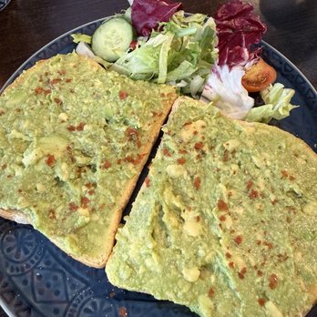 Cafe Nora - Avocado toast with mixed greens - Coffee & Tea Near Me - London, XGL Cafe Nora - Avocado toast with mixed greens - Coffee & Tea Near Me - London, XGL