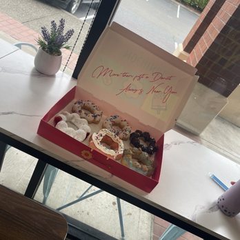 Mochinut - Our haul. We also got the Ube boba and mango lemonade with rainbow jelly. - Hot Dogs Near Me - Beaverton, Oregon