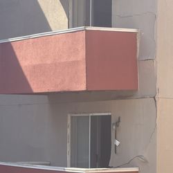 Riverview Apartments - the outside walls of a balcony
