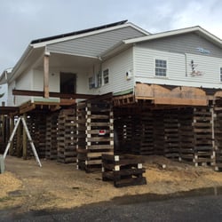 Colmyer & Sons Construction - My neighbors house has been stuck like this since September of last year. They were told their house would be raised and ready for CHRISTMAS