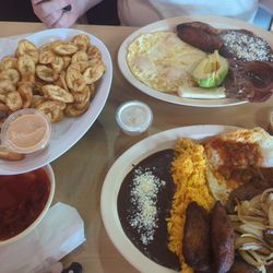 Taqueria El Manantial - Special breakfast with steak and Honduran breakfast with pork chop.
