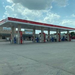 County Quick Mart - Gas station, parking lot, dirtiness