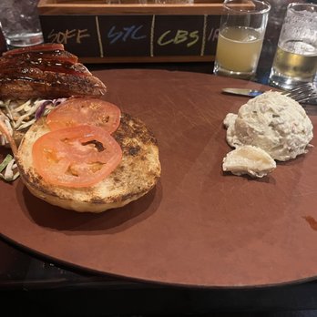 Catch 22 Gastropub - Rare tuna sandwich with side of potato salad. - New American Near Me - Athens, Georgia